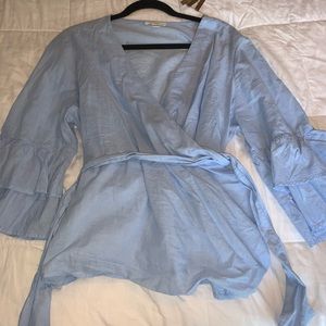 beachlunchlounge light blue wrap top.